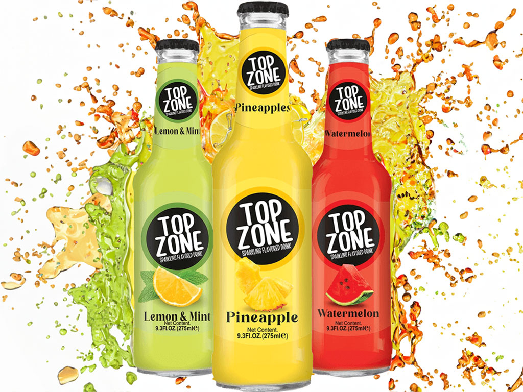 An image of Top Zone's glass bottles with a splash background featuring their drinks in green, yellow, and red. This image is featured on the page with Top Zone's first blog post.